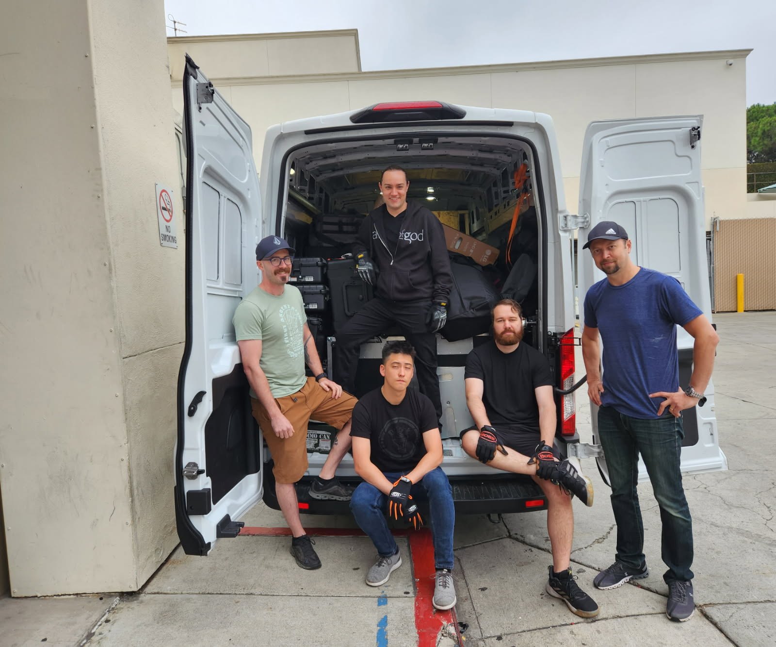 Crew at the van before load-in