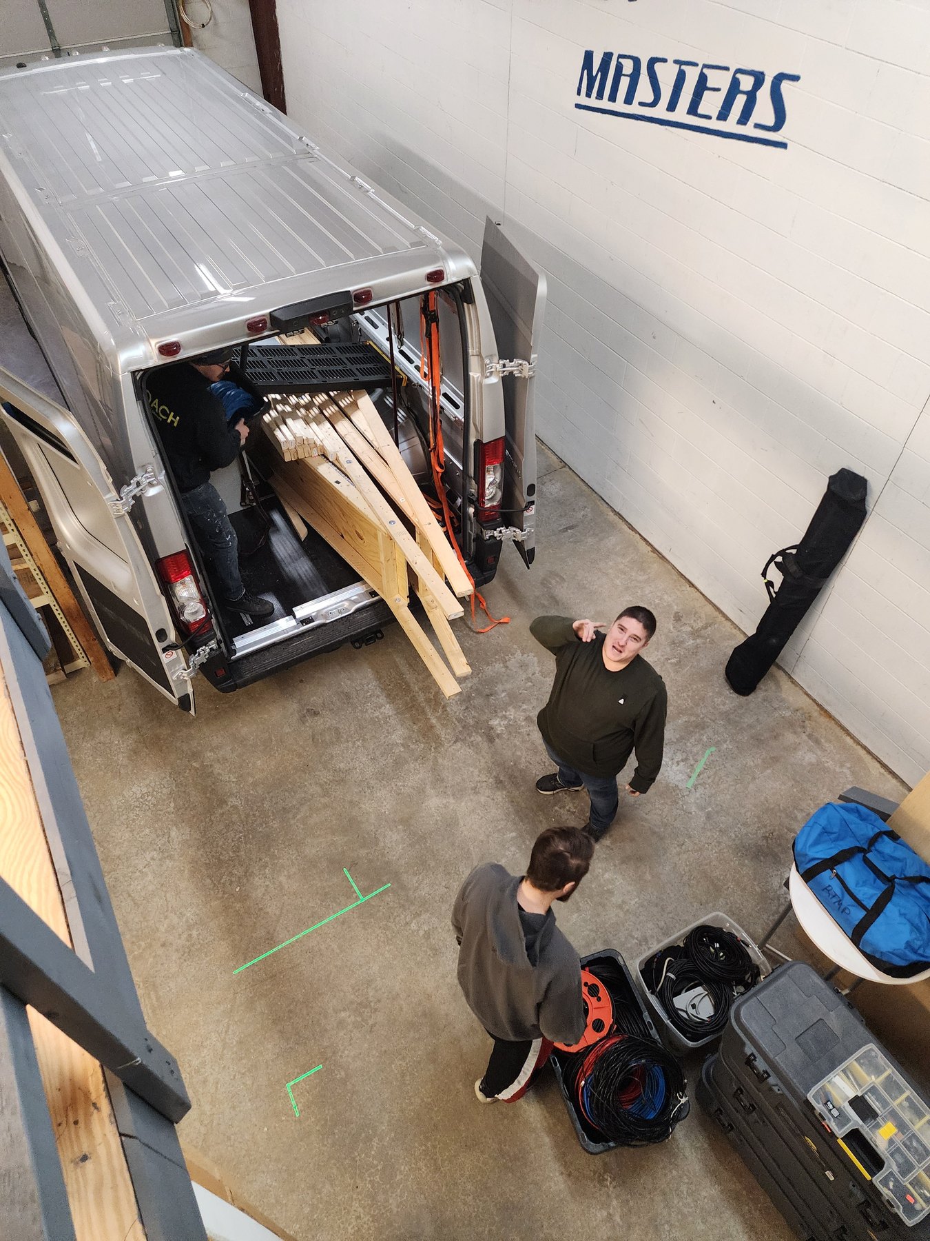 Crew loading the van after a show